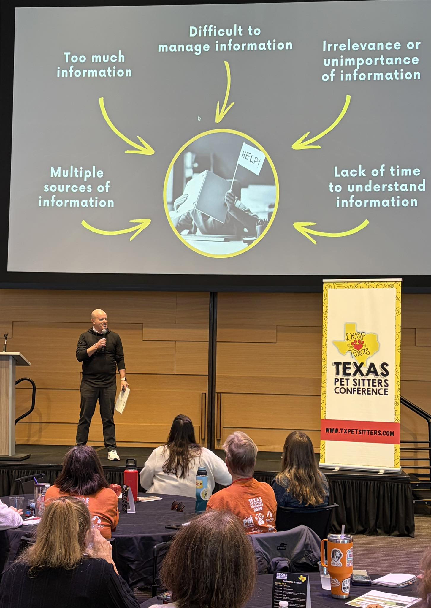 Speaker presenting on information management